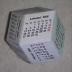 Необычный календарь в виде додекаэдра с ромбическими гарнями